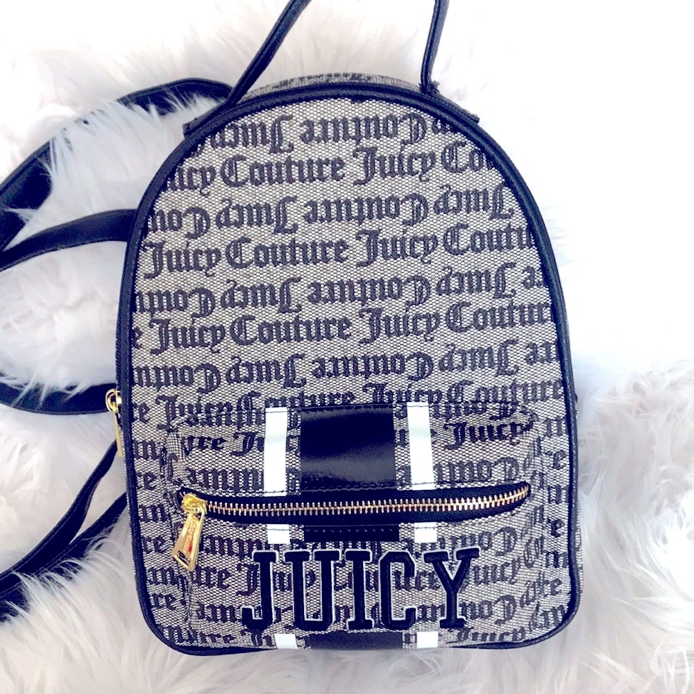 Juicy Couture black & white backpack with Old English style lettering